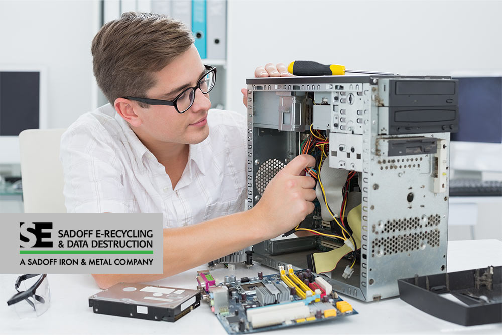 technician refurbishing a computer