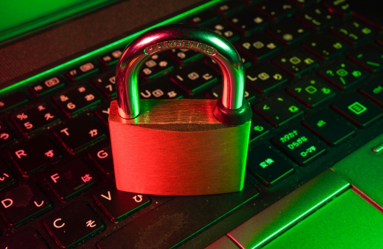 lock on a laptop with red and green background