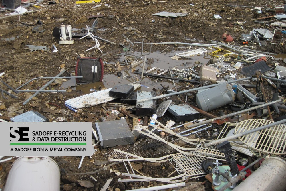 electronics in a landfill with the Sadoff logo