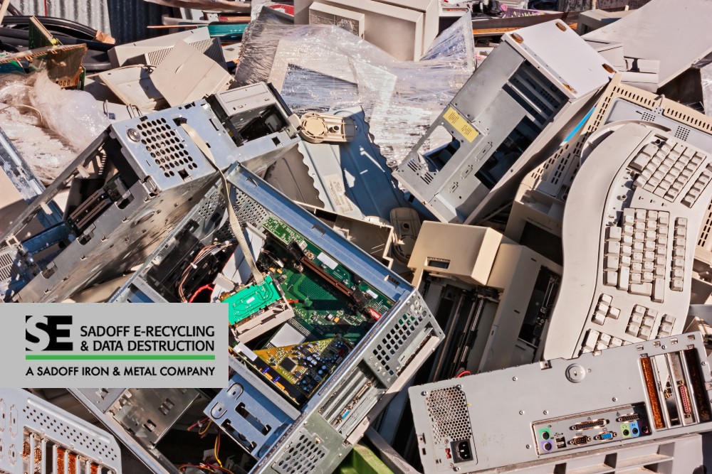 A pile of computer internals and Sadoff logo