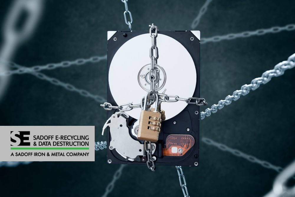 Hard drive levitated by chains and locks and Sadoff logo