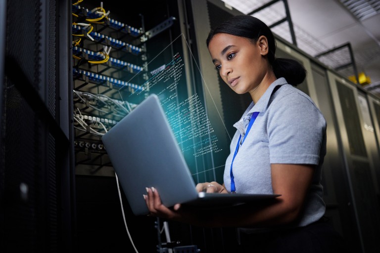 Woman working in a data center