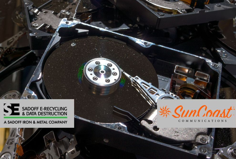 Hard drive in a pile with sadoff and suncoast logos